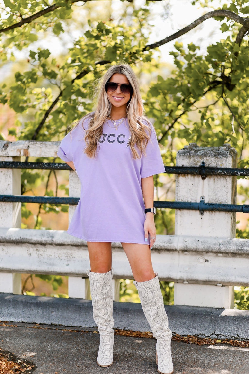 white graphic tee with purple