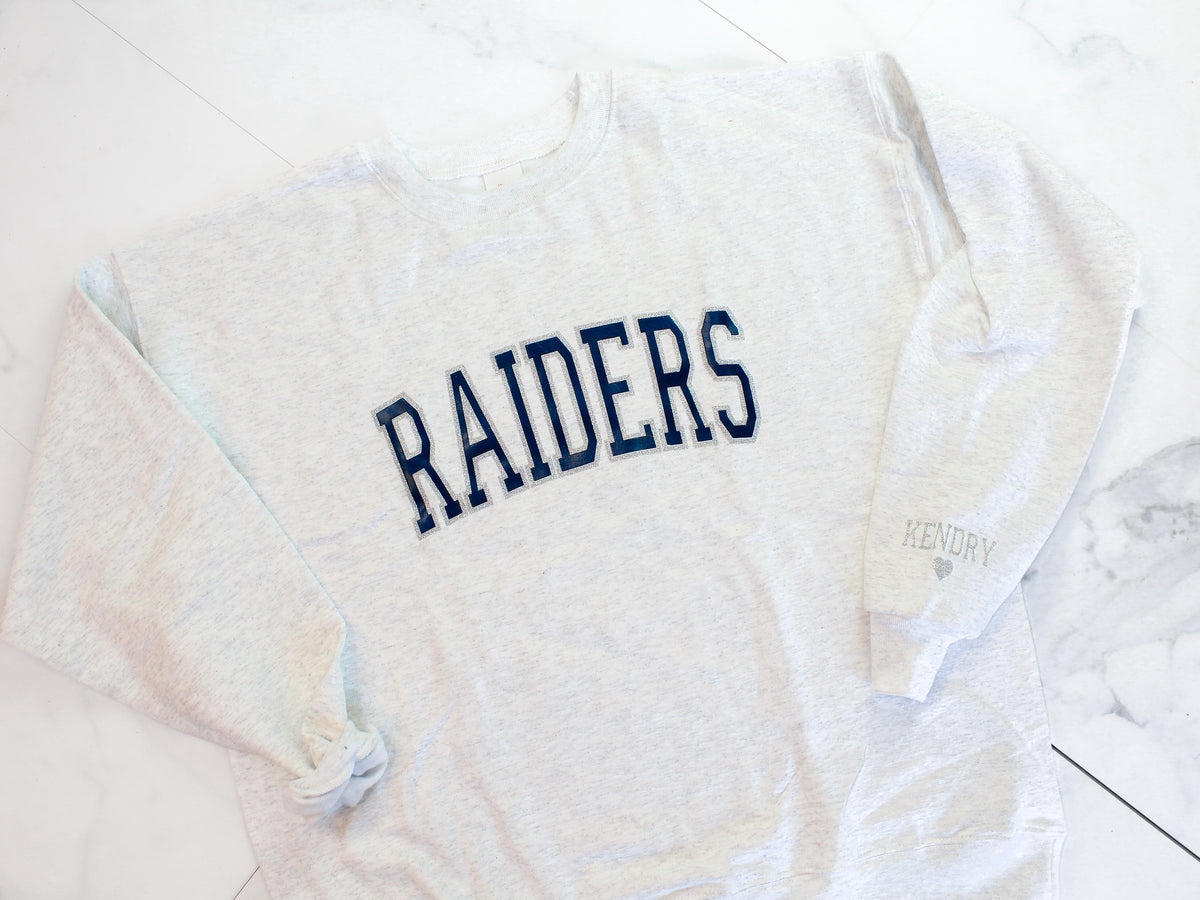 Raiders Navy And Silver Glitter Varsity Sweatshirt