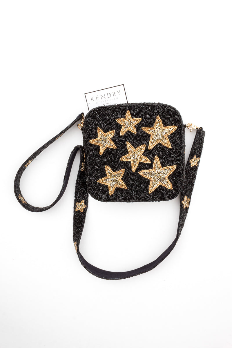 Beaded box purse with black background and vibrant gold stars on the front with a matching blue removable strap. Black and Gold Stars Beaded Square Purse - Shop Kendry Boutique