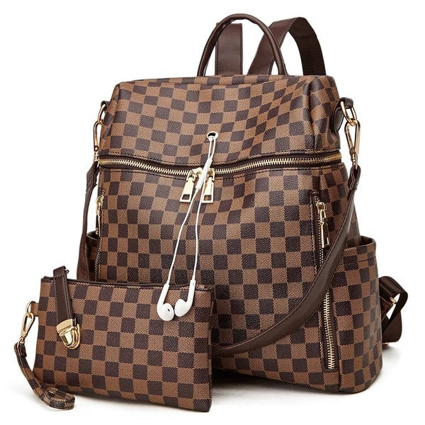 Trendy vegan leather checkered back pack perfect for everyday use. Features inside lining, detachable coin purse, additional shoulder strap, bottle pockets, multiple pockets and hole for headphones. Shop Kendry Collection Boutique