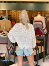 Distressed Confetti POL Sweater