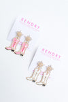 Our pearl and enamel cowgirl boot earrings are perfect for wearing to Nashville! 