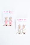 Our pearl and enamel cowgirl boot earrings are perfect for wearing to Nashville!  - Kendry Collection Boutique