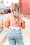 One shoulder puff sleeve smocked top featuring ruffle hem. Pair it with a trendy white skirt and you're ready to go! Pink Puff Sleeve Smocked Top - Shop Kendry Collection Boutique