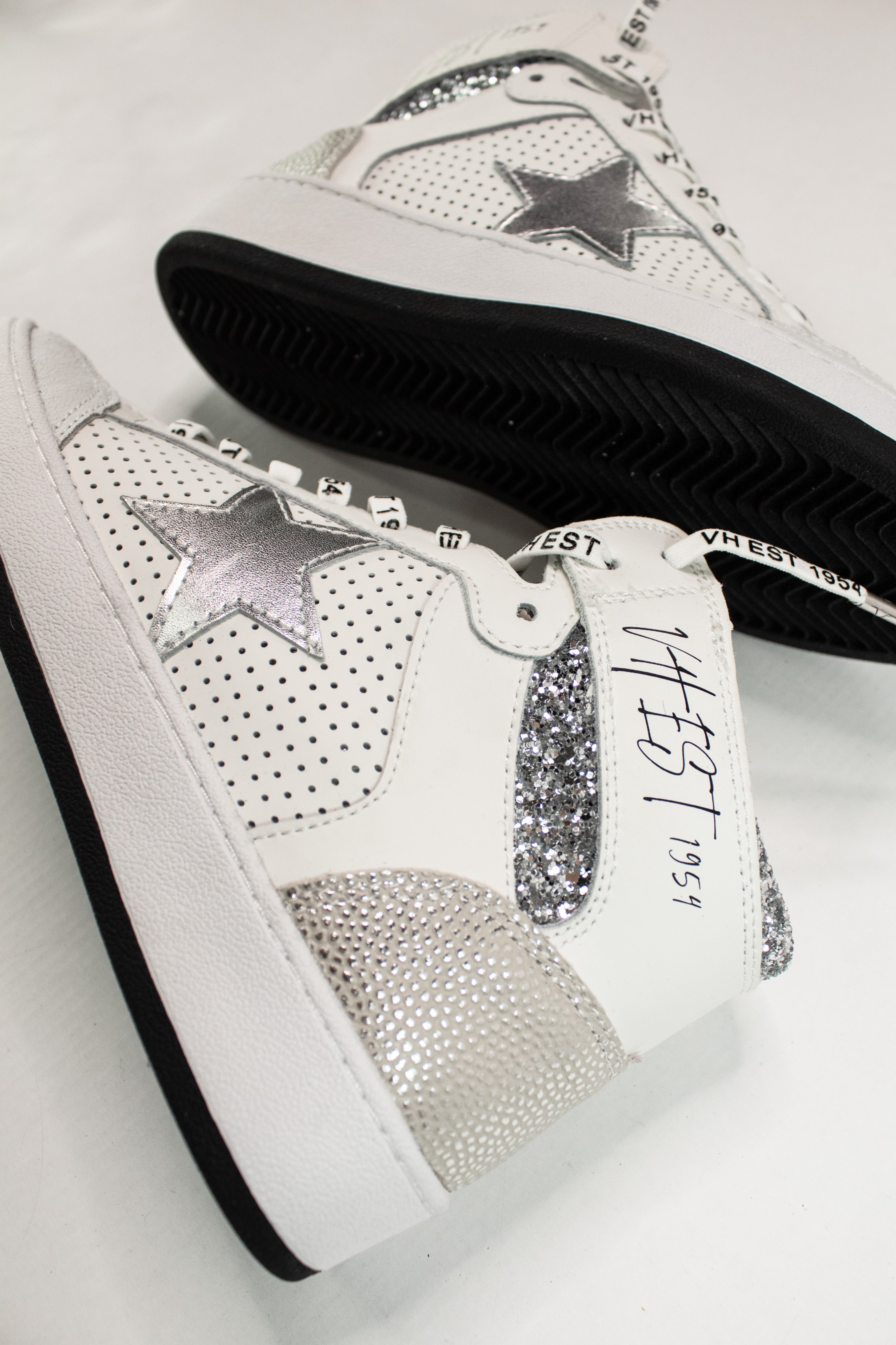 Silver high top sneakers top